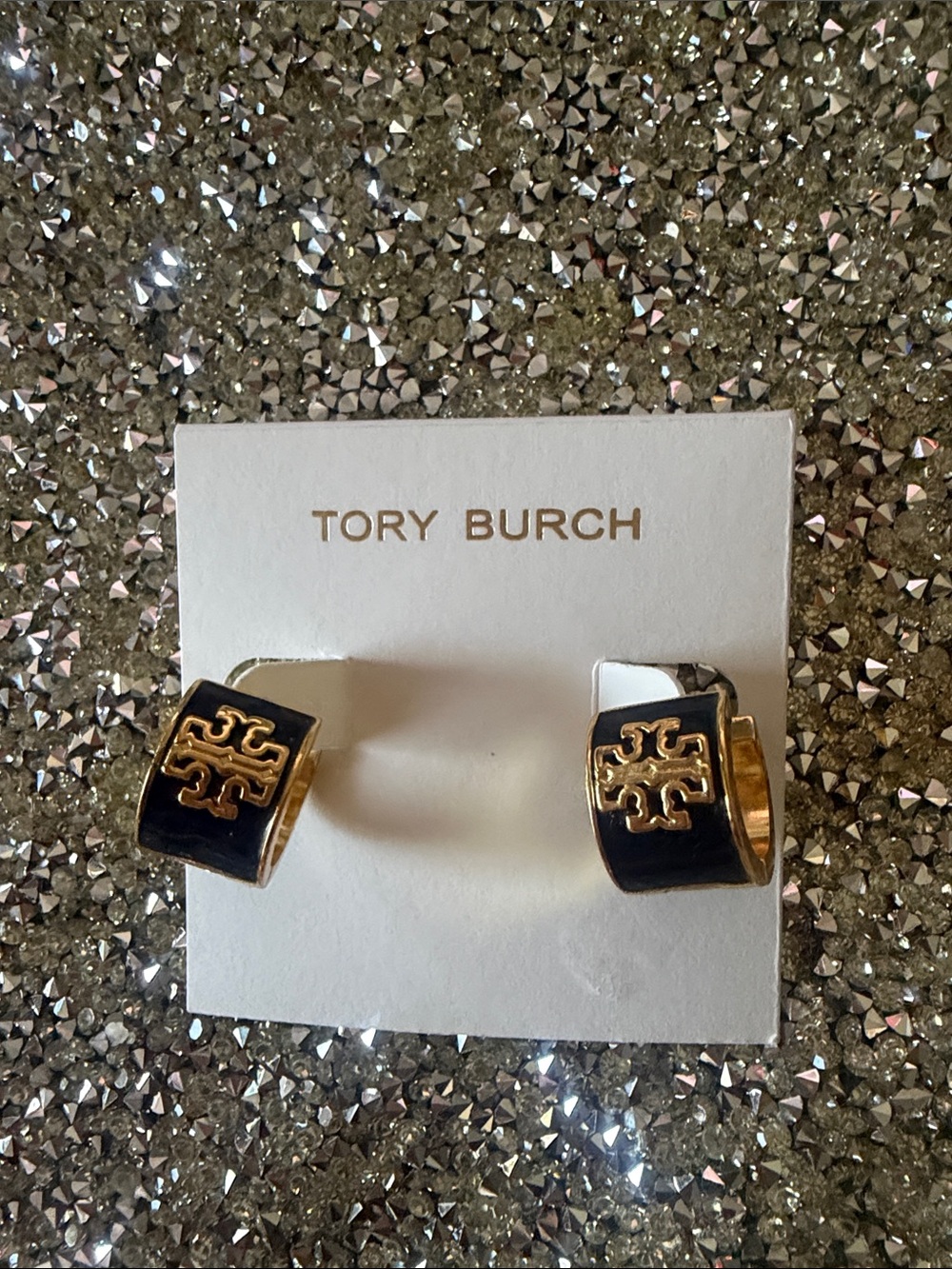 Tory Burch Black and Gold Enamel Logo Huggie Earrings